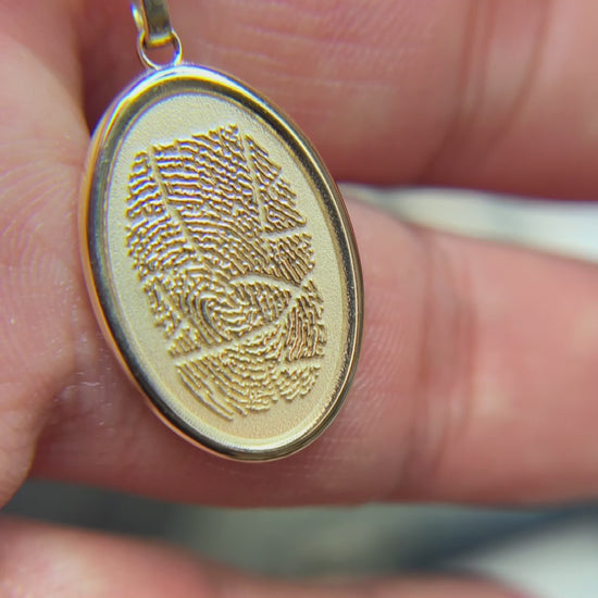 Load and play video in Gallery viewer, Fingerprint Print Oval Charm
